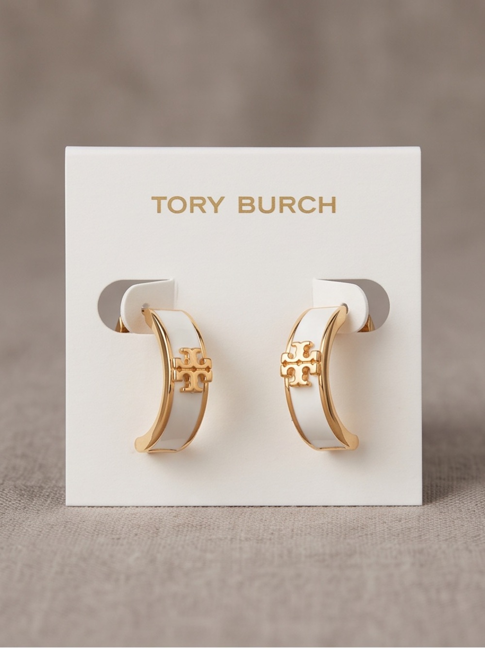 Tory Burch White and Gold Enamel Logo Huggie Earrings